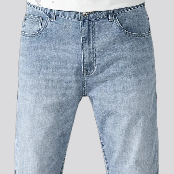 Mid rise light sanded men's jeans